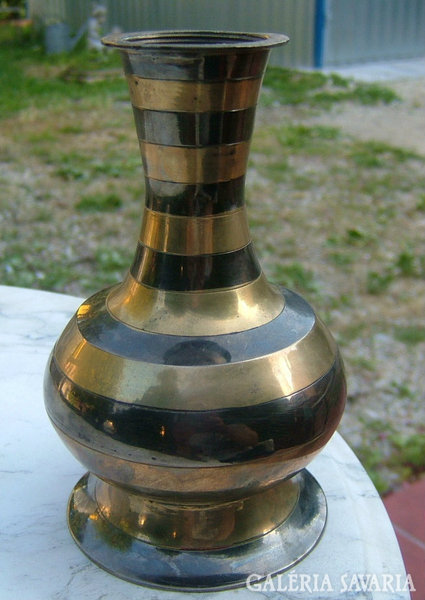 Copper vase with striped pattern