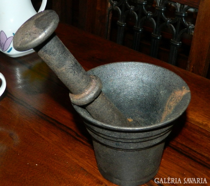 Antique iron mortar with pestle