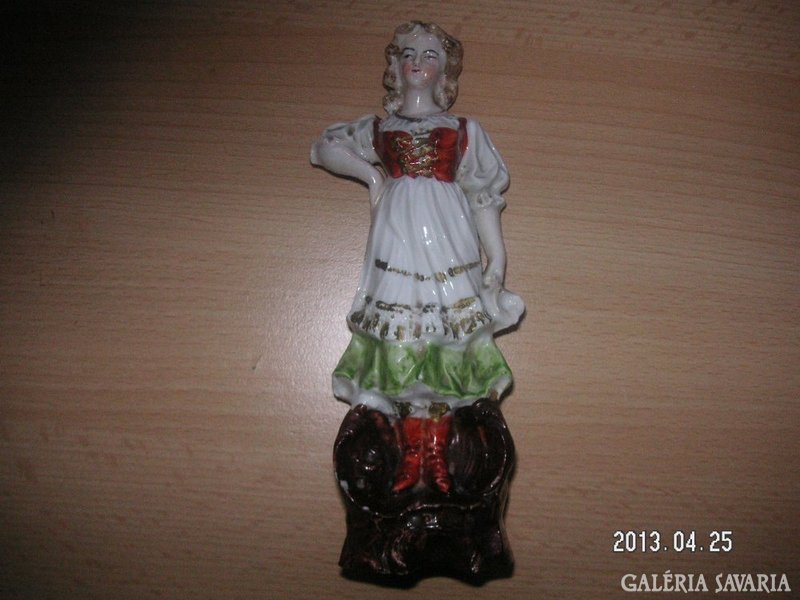 Monarchian porcelain girl in beautiful folk costume