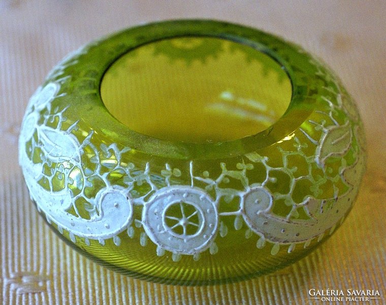 Tiny uranium green glass bowl with hand-painted lace decoration.