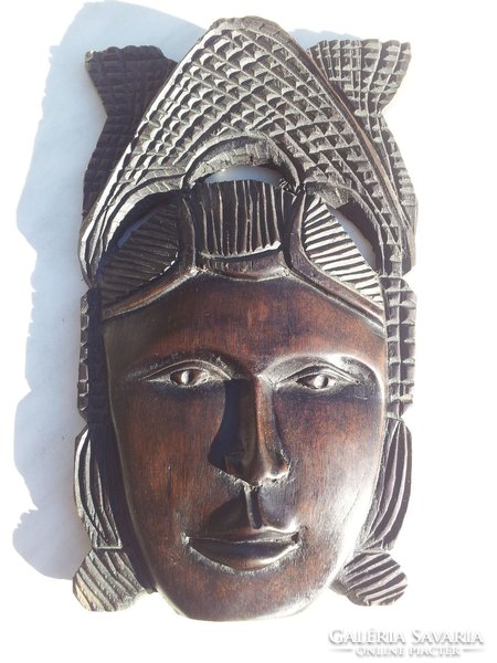 African black woman with wooden mask