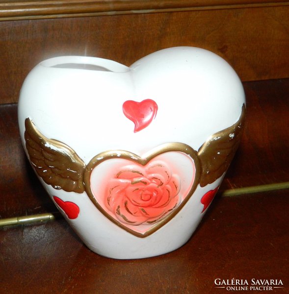 A heart vase marked with applied art