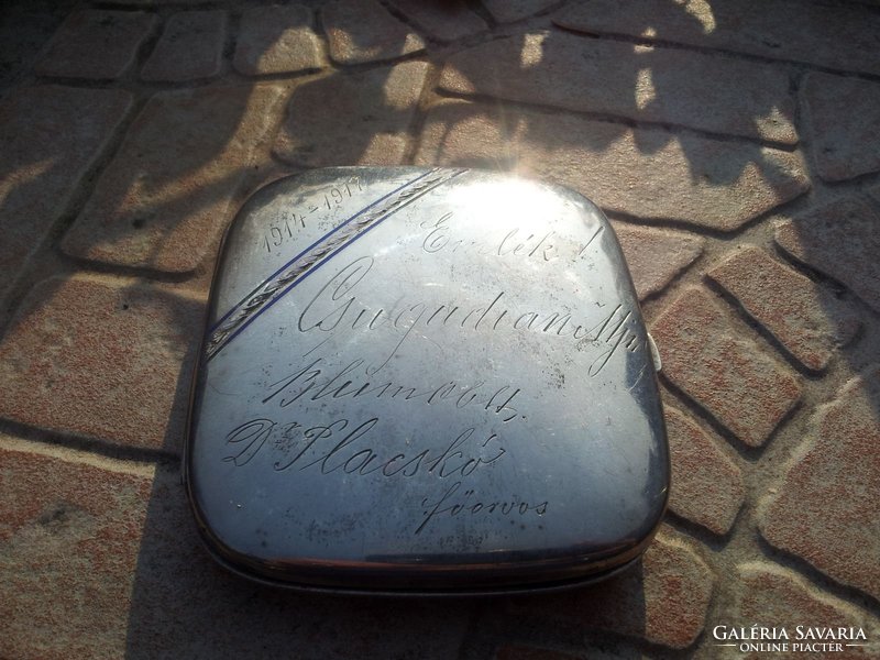 Silver cigarette case with dose inscription