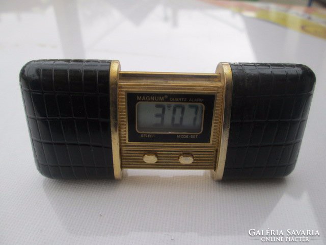 A real rarity from the '80s, a quartz travel watch in a croco case