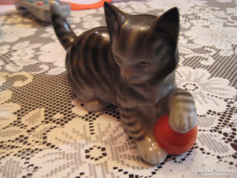 A playful porcelain kitten