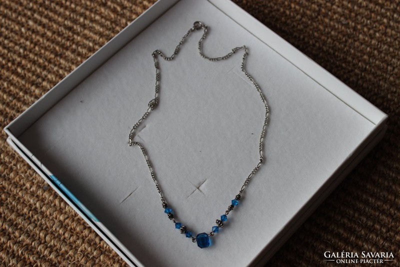 Silver necklace with blue zircon