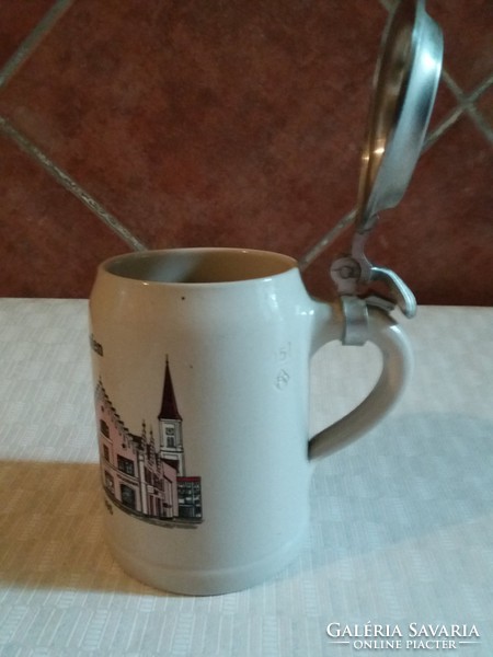 Old beer cup with lid