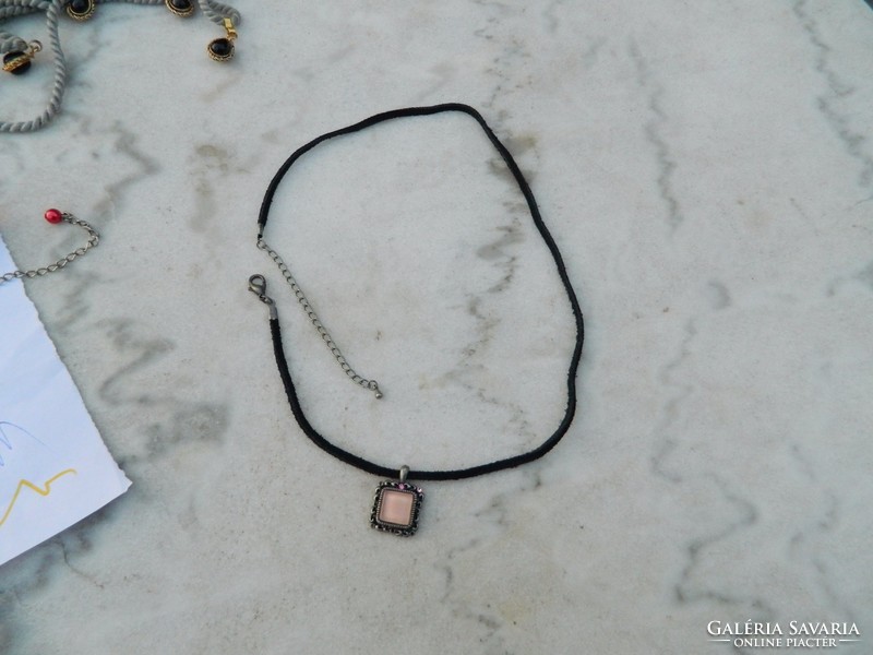 Pendant with pink stone on a leather strap - necklace