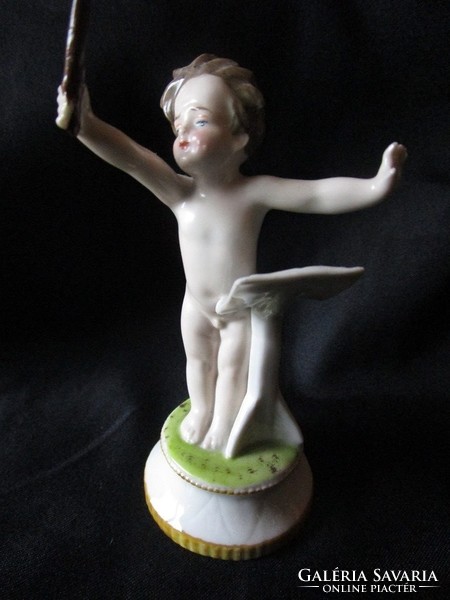 Schaubach art porcelain conductor boy angel putto