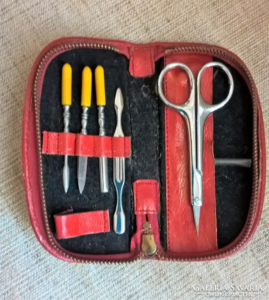 Old manicure set in a red case