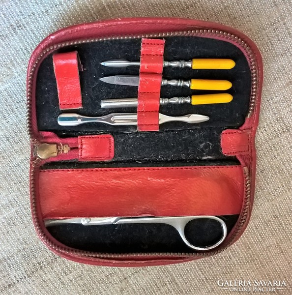 Old manicure set in a red case