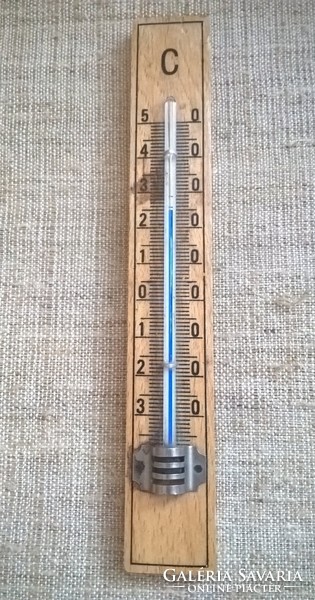 Old wooden wall thermometer