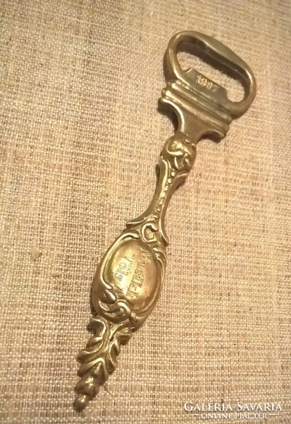 Beer opener with old copper pattern