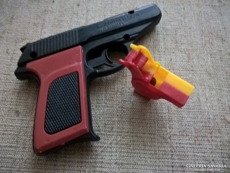 Retro toy gun and bird-shaped whistle in one