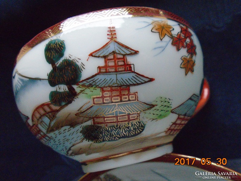 Kutani hand painted golden contoured Japanese eggshell with tea cup placemat