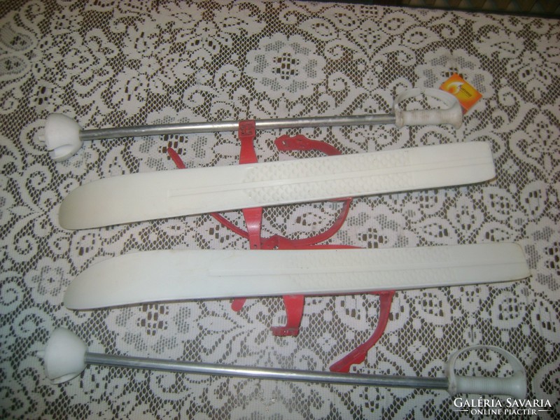 Retro children's ski equipment - skis with ski poles