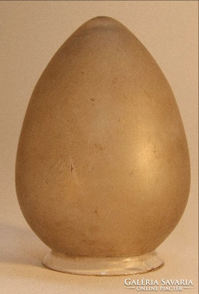 Brown-colored, egg-shaped hood