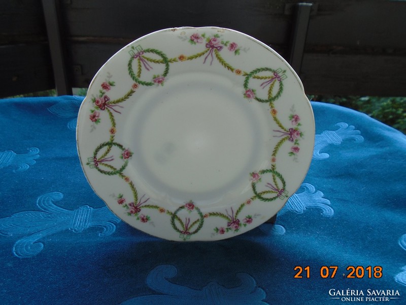Ges.Geschützt austria Art Nouveau decorated plate with garland 16 cm