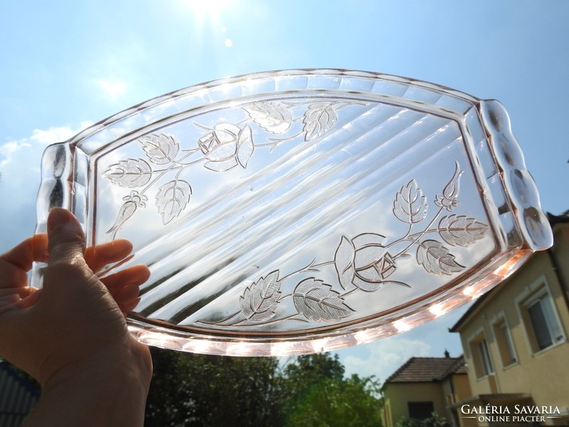 Old mauve glass tray with a rose pattern
