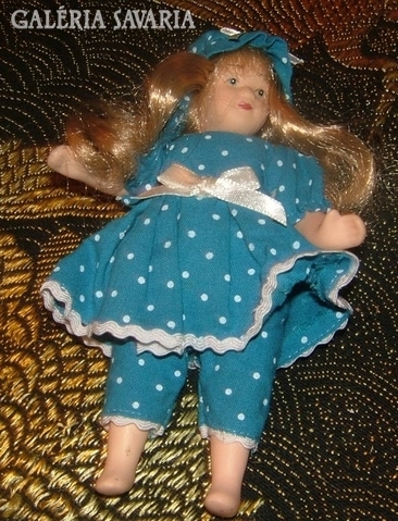 Old little porcelain doll
