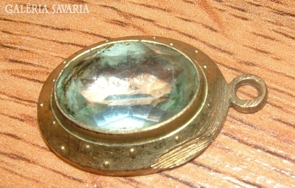 Antique copper (?) pendant with pale blue jewel