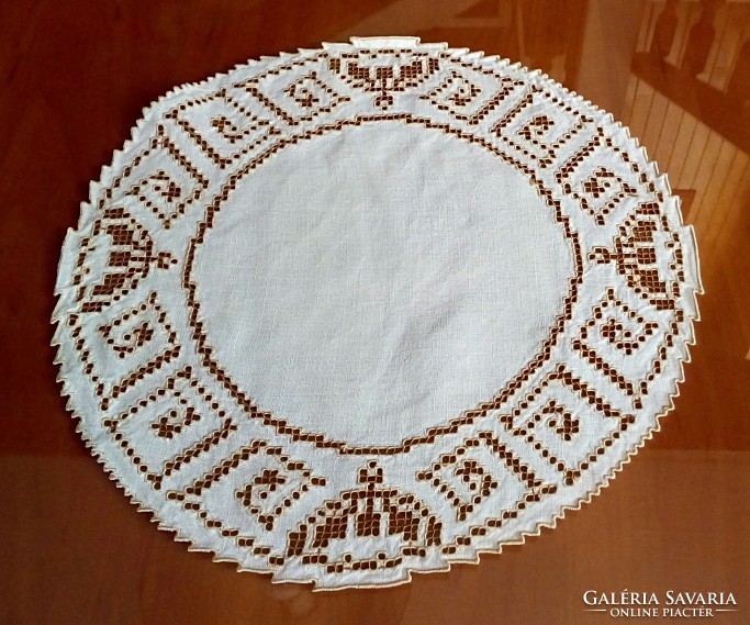 Crowned, embroidered tablecloth