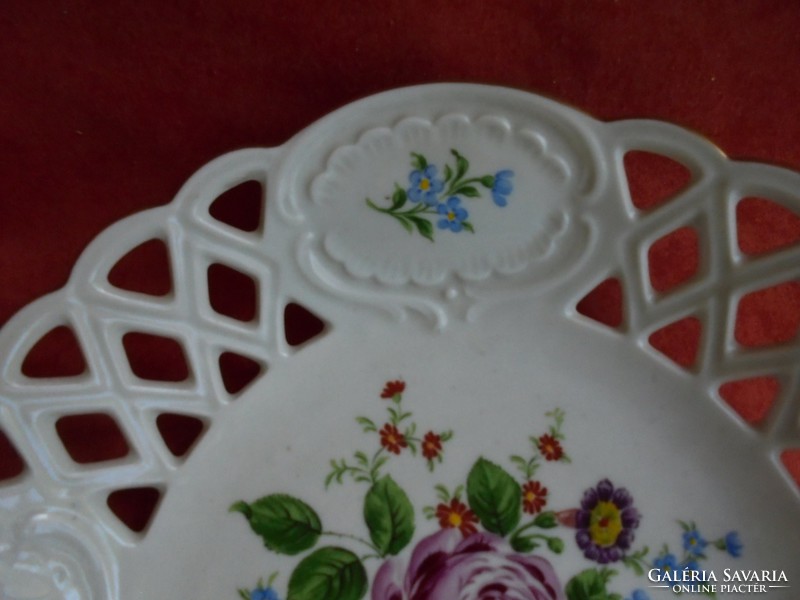 Bowl of rosy porcelain with pierced edges
