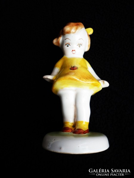 A rare ochre-yellow Bodrogkeresztúr ladybug girl