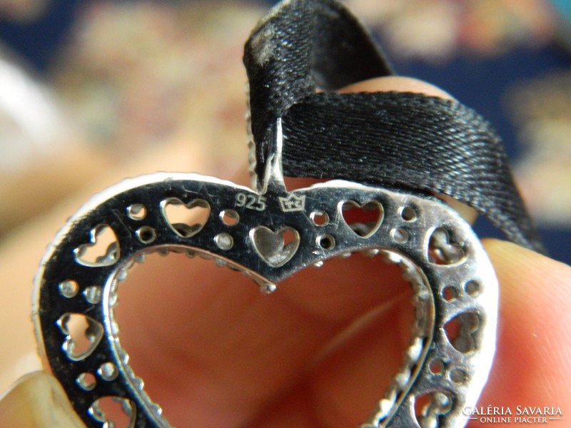 Stone-encrusted modern silver heart pendant with velvet ribbon