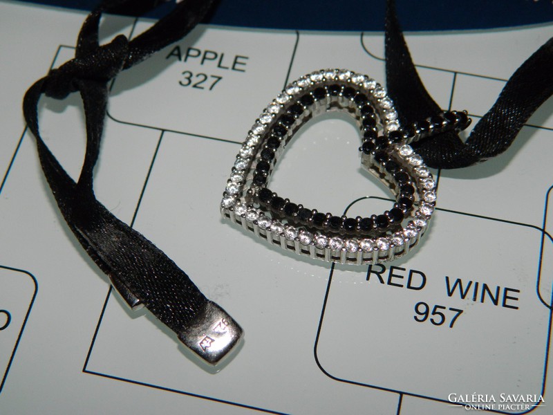 Stone-encrusted modern silver heart pendant with velvet ribbon