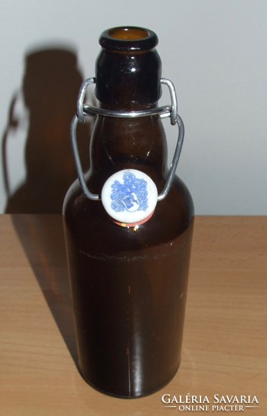 Old buckled beer bottle