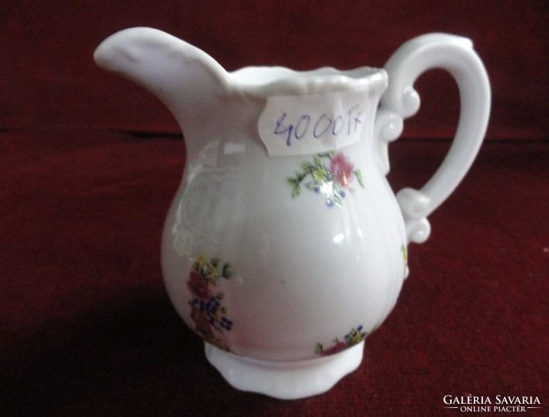 Zsoslnay porcelain, milk pourer. Beautiful shape with solid colorful flower pattern. He has!