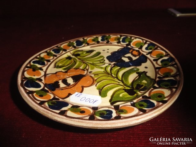 Mini ceramic wall plate, with a folk pattern, hand painted. He has!