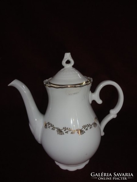 Mz Czechoslovak porcelain tea pourer. On a snow-white background with a golden border and pattern. He has!