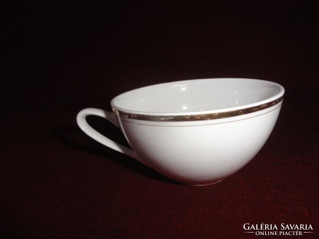Mz Czechoslovak antique tea cup, snow white, gold border. He has!