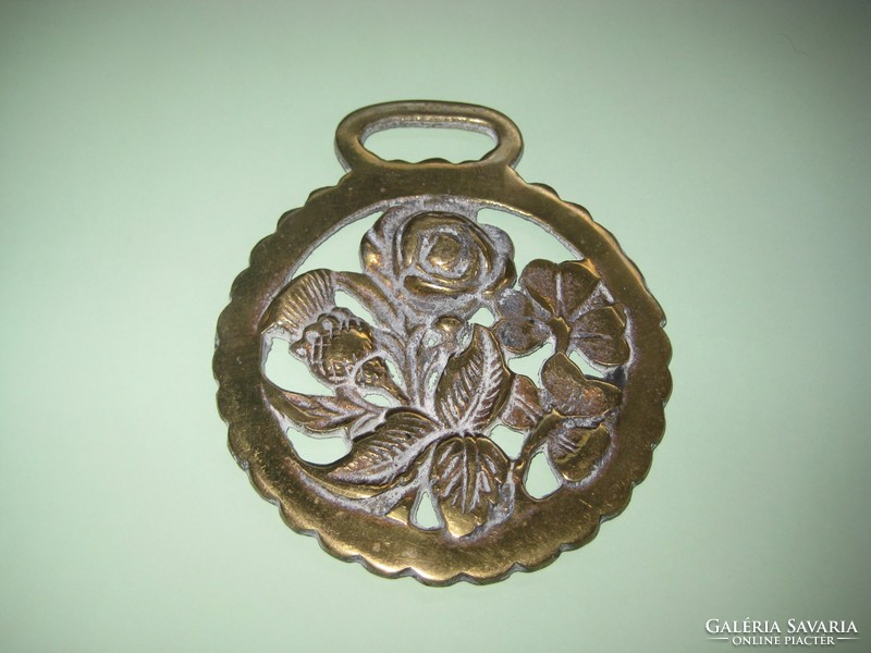 Bronze ornament, horse for tools, with rose decoration
