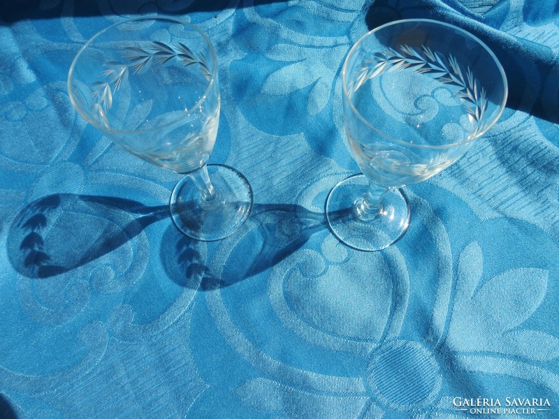 Pair of old hand polished stemmed wine glasses