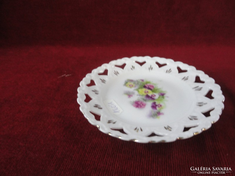 Oriental porcelain cake plate, openwork edge, with a colorful flower in the middle. He has!