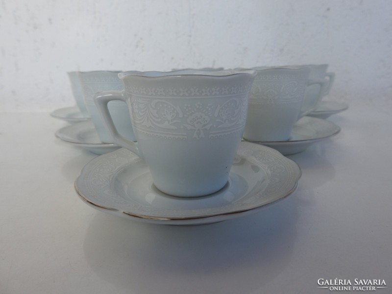 Coffee set for 6 people with a discreet white pattern with an old gold border
