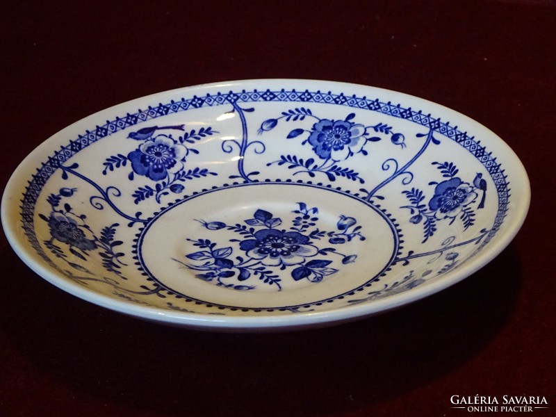 Indies English porcelain tea cup placemat with Johnson Bros cobalt blue pattern. He has!
