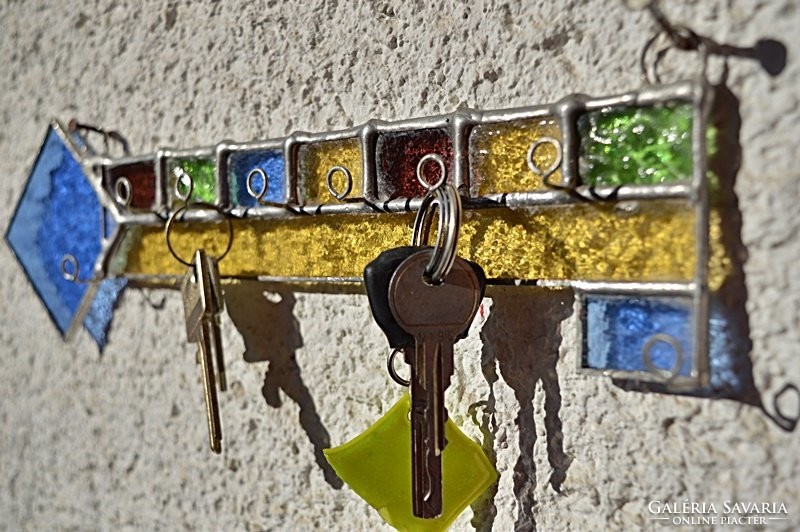 X. Tiffany 8-piece wall key holder by artist.