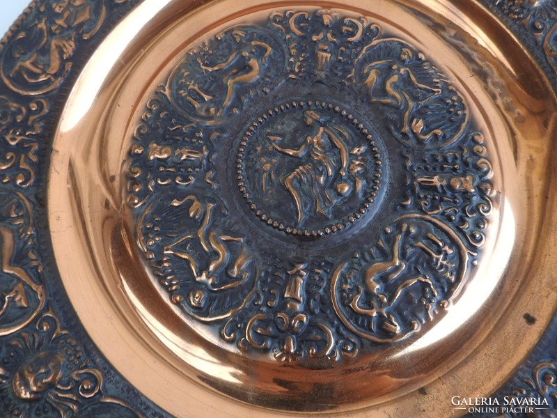 Red copper plate wall plate with a relief pattern with a mythological scene - decorative plate