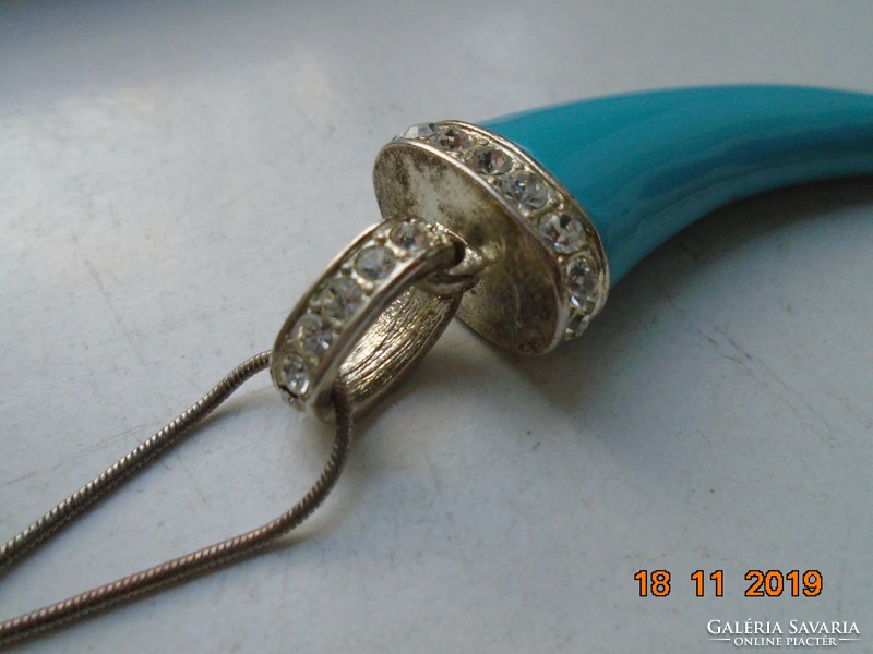 Turquoise tiger tooth pendant, talisman, silver-plated swarovski crystal socket and ring, snake chain
