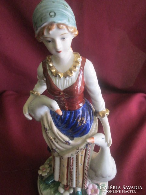 Porcelain with sword mark, lady with geese, flawless piece