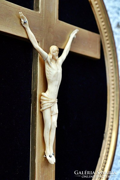 22. Antique, bone of Jesus Christ (12 cm), cross, corpus in 34 cm oval wooden frame.1780.