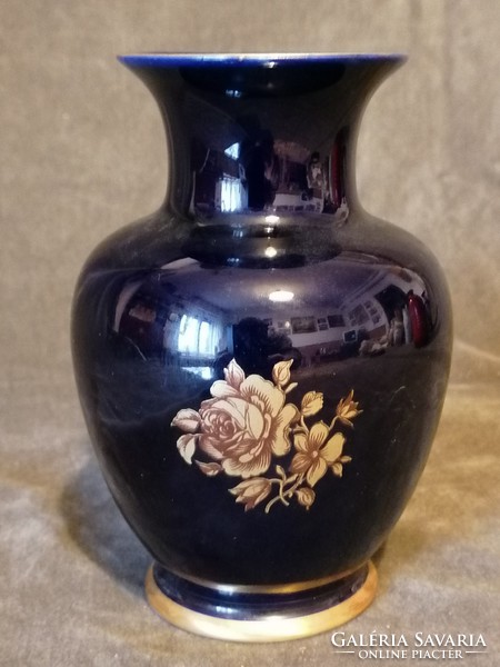 Porcelain raven house vase