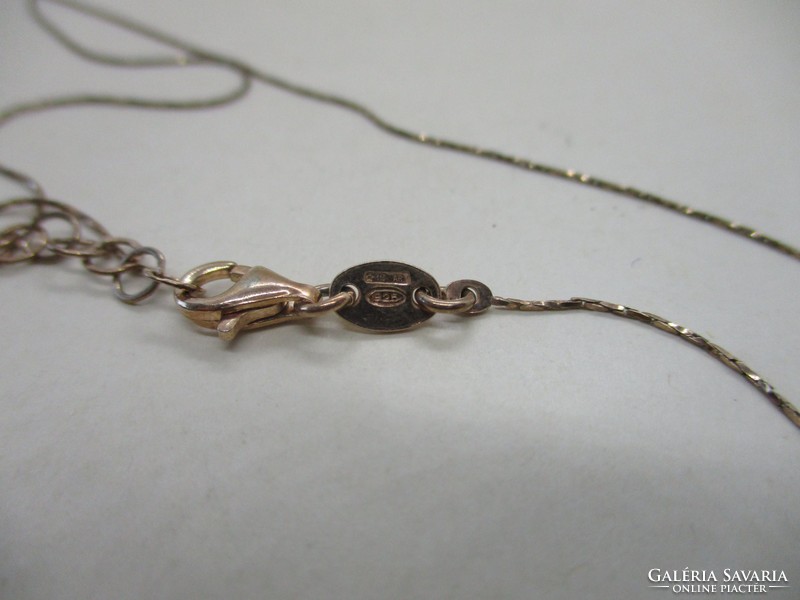 A wonderful gold-plated silver necklace with a stone pendant