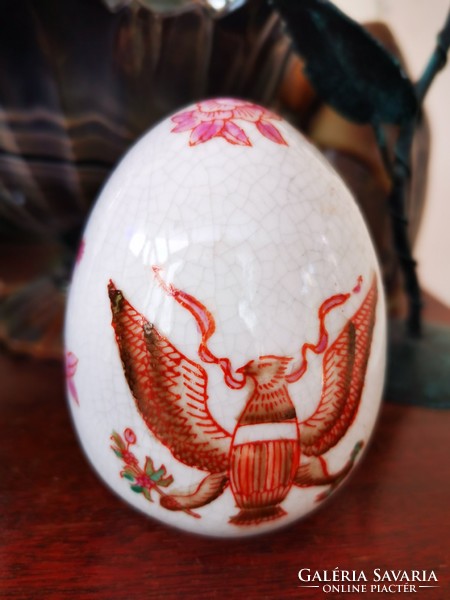 Antique porcelain egg with griffin bird