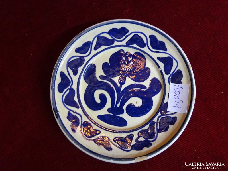 Hand-painted glazed ceramic wall ornament with folk motif, diameter 12.5 cm. He has!