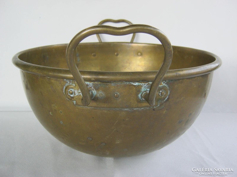 Marked old copper confectioner bowl with foam